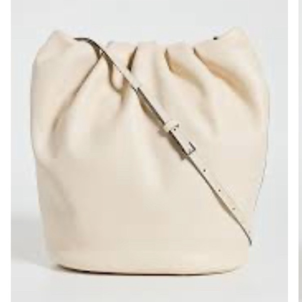 STAUD Cream Leather Bucket Bag with Adjustable Shoulder Strap